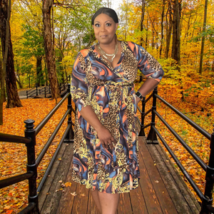 This Safari Chic dress is crafted to flatter and dazzle. It features a plunging V-neck, 3/4 sleeves, and a wrap self-tie that emphasizes your curves. 