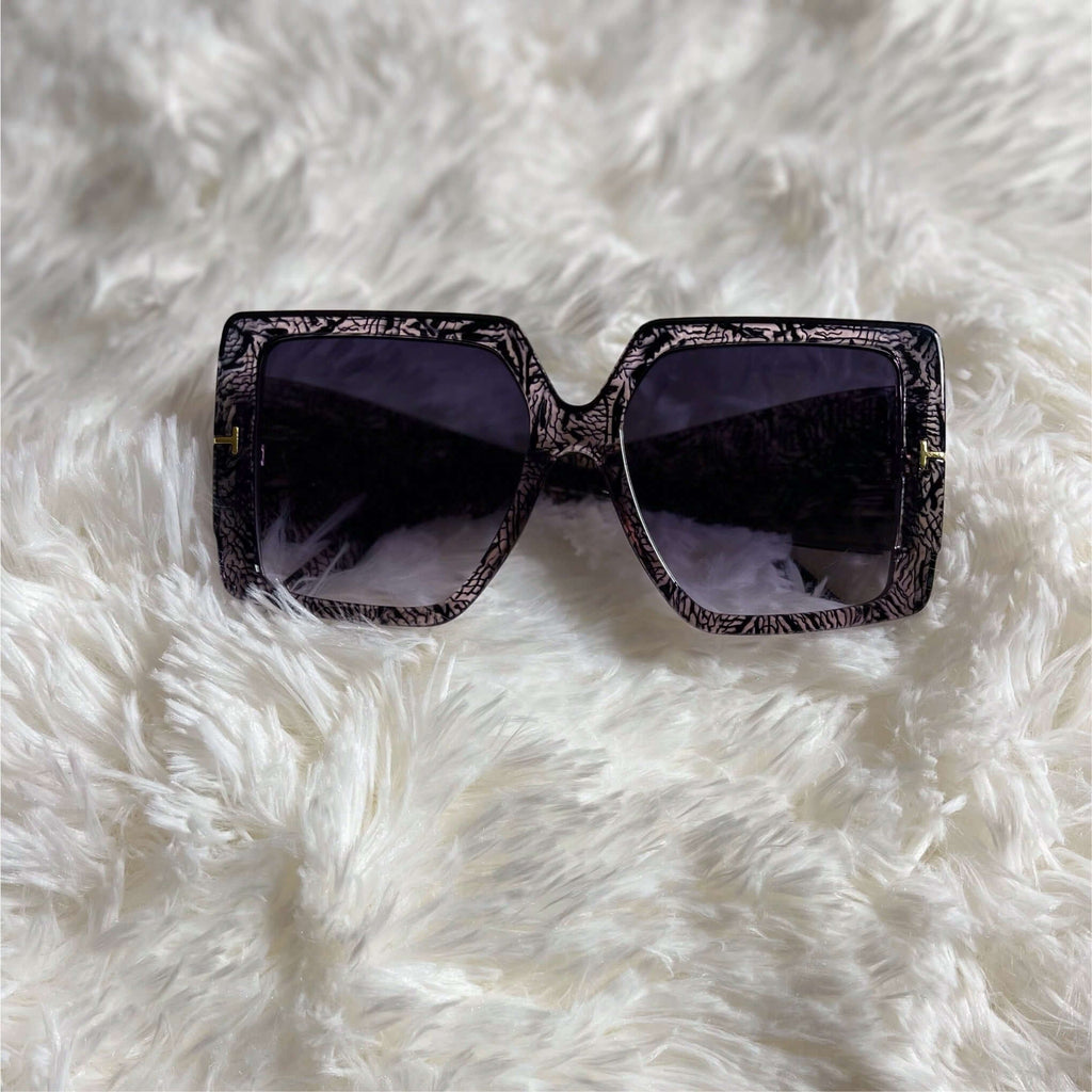 Chic and stylish oversized sunglasses in  purple black ombre .. 